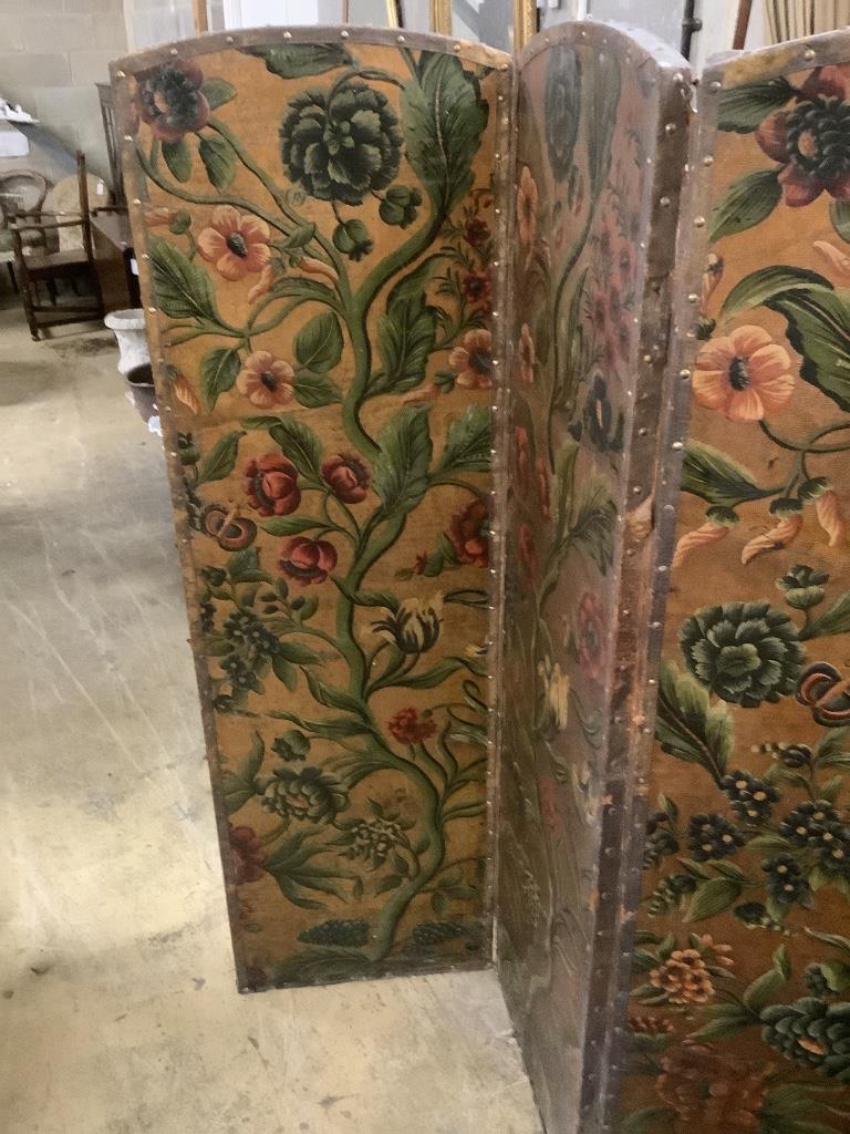 A Spanish leather folding six panel draught screen, with embossed floral printed card panels, height 168cm
